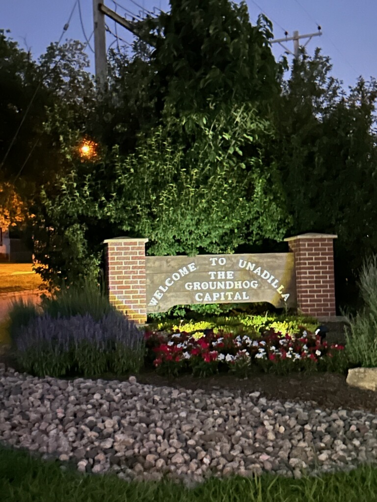 Night time welcome sign