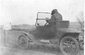Faithful Mail_Man_Grant_Stoner_at_Gus_Holschers_mail_box_300